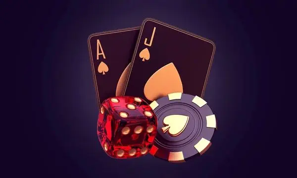 Playing cards, a red die and a casino chip